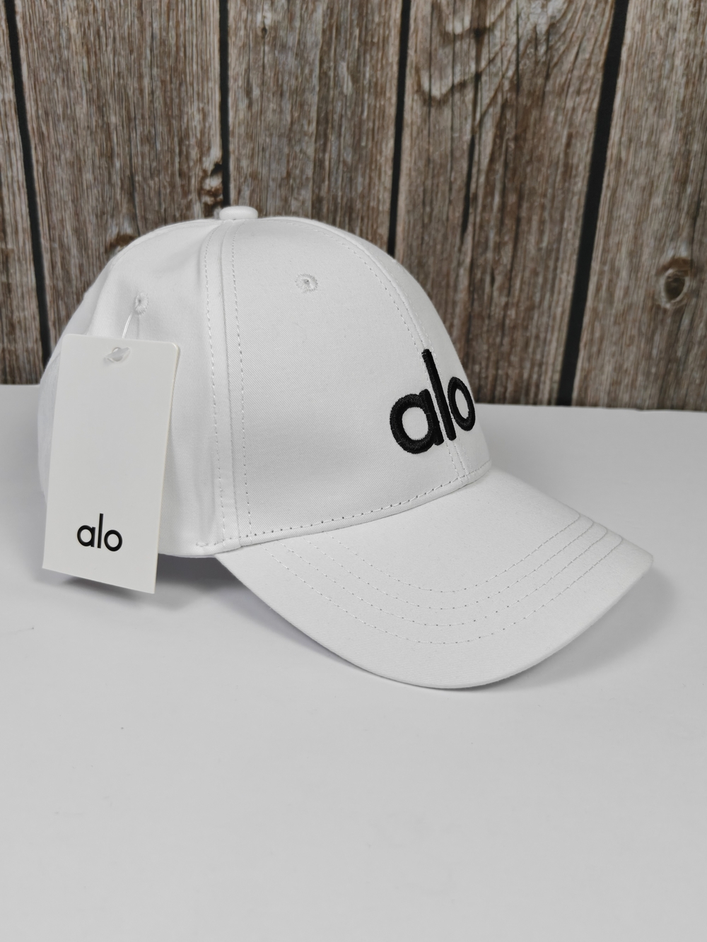 ALO Yoga White Cap with Black Logo - Picture 2 of 4
